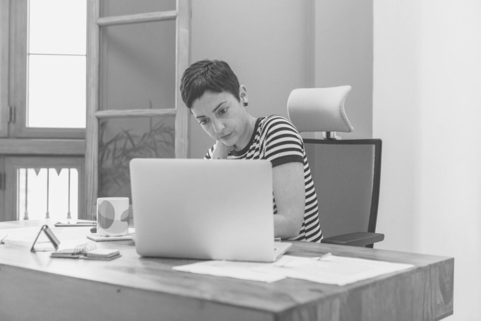 Professional reviewing investment learning materials and documentation